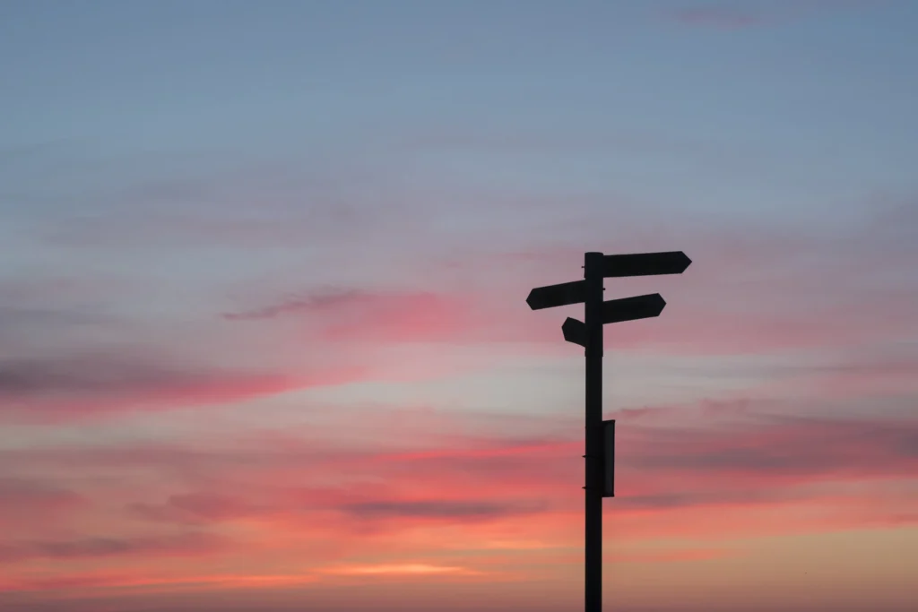 what to expect in act therapy for eating disorders -  sign pole with directions in the sunset